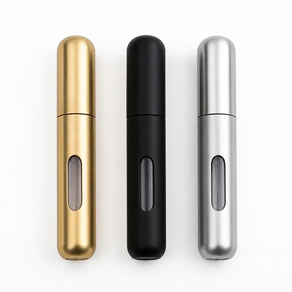 Three refillable atomisers in gold, black and silver
