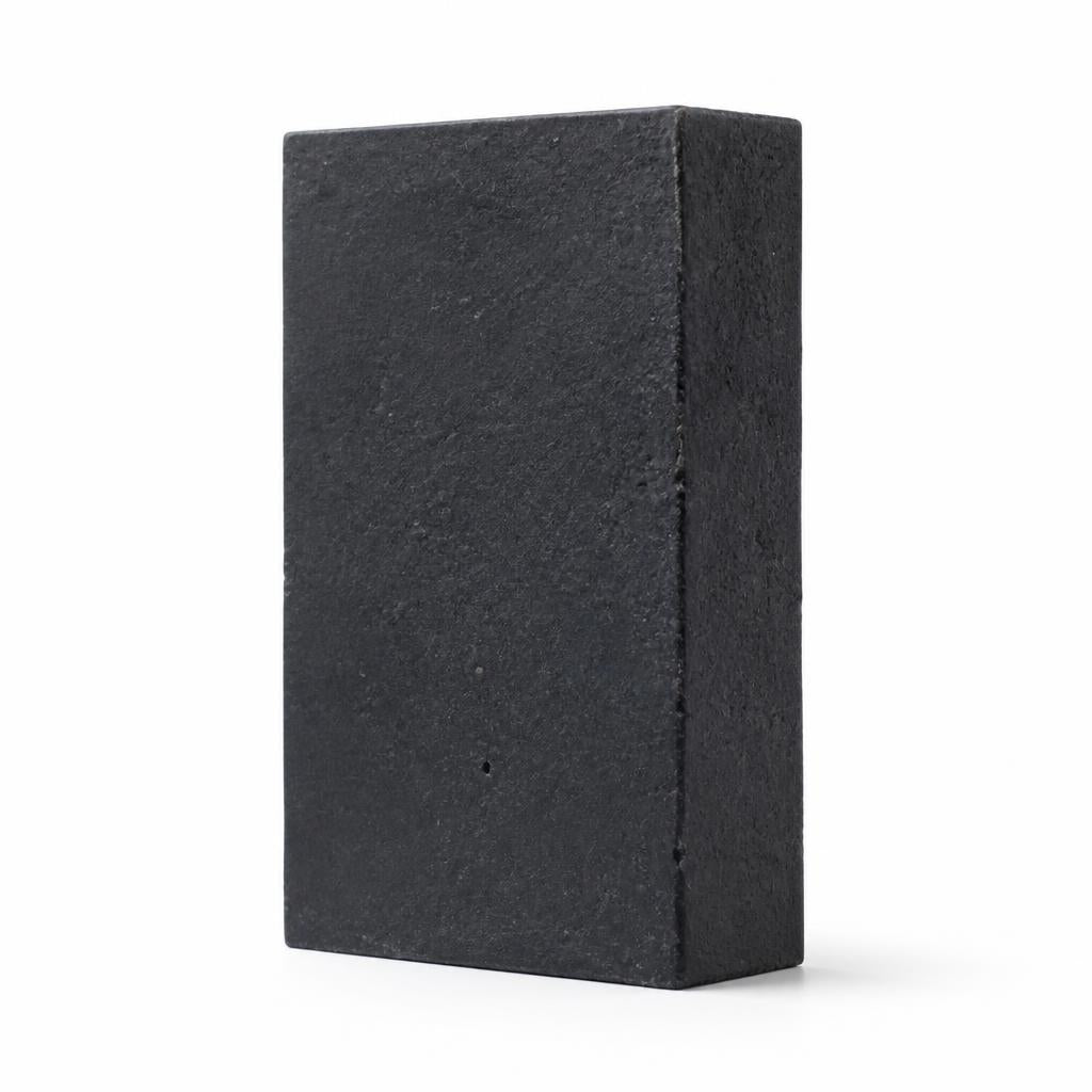 Charcoal cleansing bar standing upright