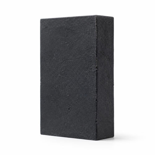 Charcoal cleansing bar standing upright