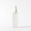 Hydrating facial mist bottle on white background