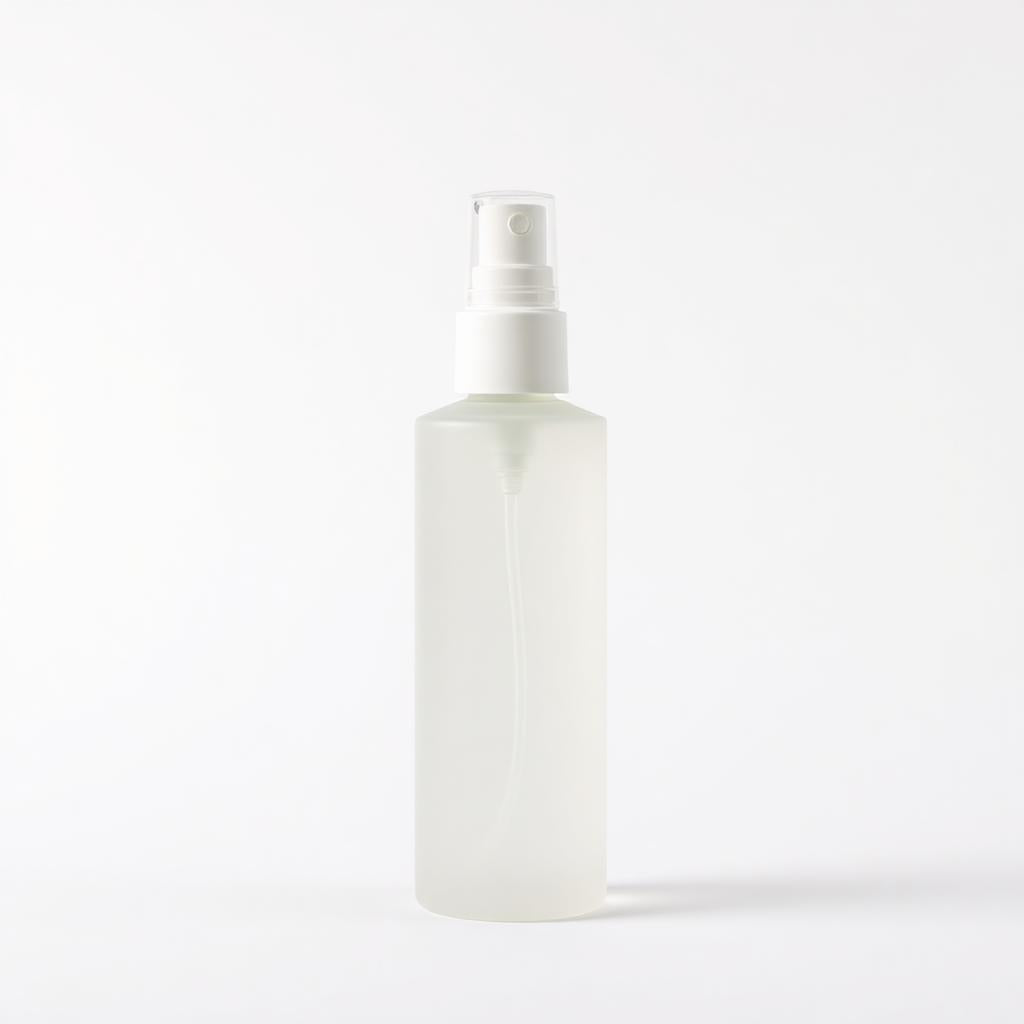 Hydrating facial mist bottle on white background