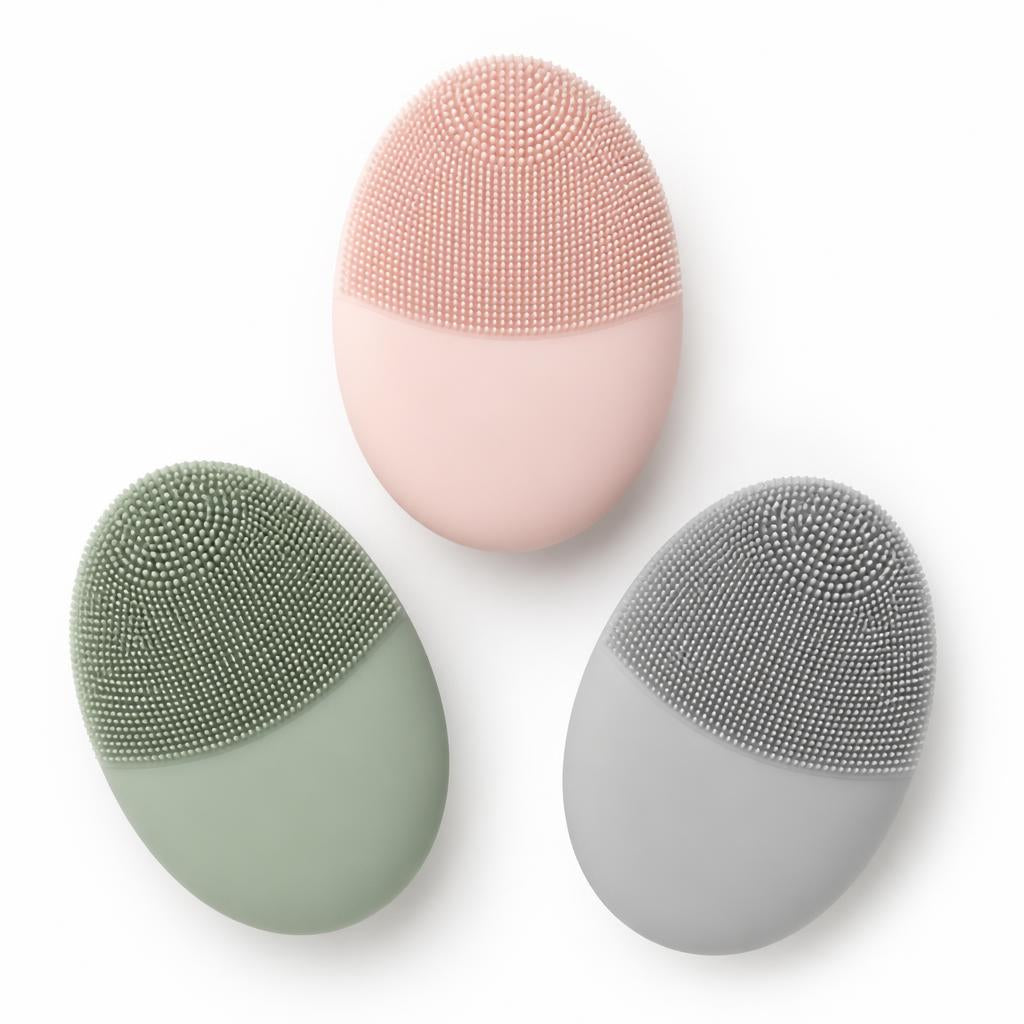 Three silicone cleansing brushes flat lay